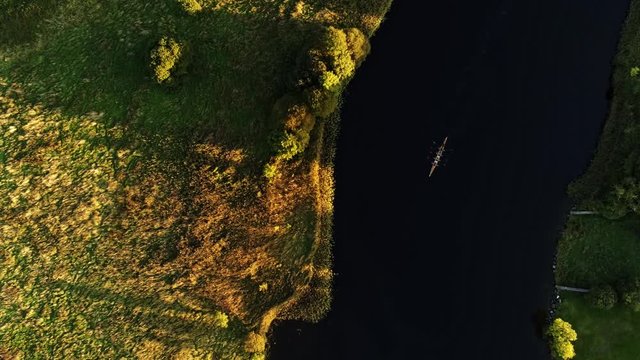 4k Aerial view of People rowing in Corrib river, Galway, Ireland