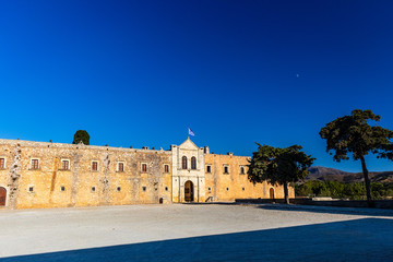 Fototapeta premium Outer building enclosing the courtyard of Arkadi monastery (Moní Arkadíou), an Eastern Orthodox monastery located next to Rethymno, North Crete, Greece