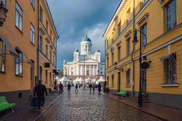 Fototapeta na wymiar Helsinki. Finland Cathedral on the Senate square. St. Nicholas Cathedral on a summer day. The streets of Helsinki. Suurkirkko. Helsinki lane. City landscape from Finland. Cities of Finland