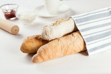 French bread and ciabatta baguette on a table