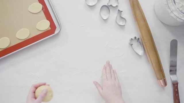 Step by step. Flat lay. Rolling out Sugar cookie dough with French rolling pin.