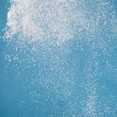 Snow and blowing snow. The texture of the snowflakes flying