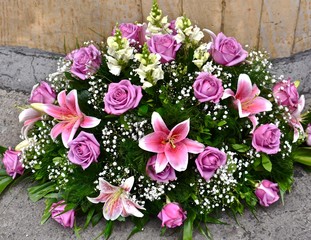 bouquet of flowers on wooden background