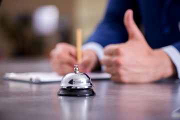 Hotel reception bell at the counter