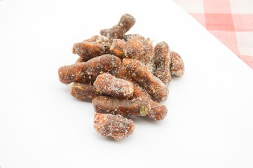 tamarind with sugar dessert on white background