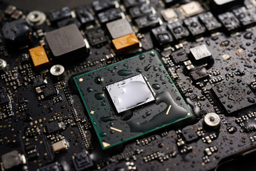 A black colour waterproof water resistant Printed Circuit Board with CPU, SMD & IC mounted part on...