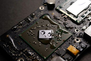 A black colour waterproof water resistant Printed Circuit Board with CPU, SMD & IC mounted part on...