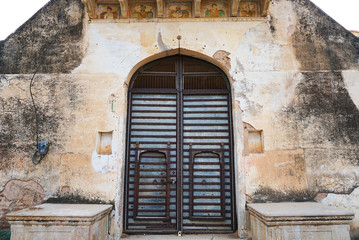 Fototapeta premium Local house doors in Mandawa, Jaipur, India. Traditional architecture is Haveli