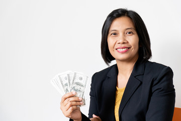 Business Asian Woman Holding Banknote on White Background, Smiling and Happy Office Manager Concept