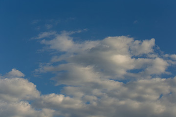 .Clouds in the firmament, evening sunset, clear Sunny day.