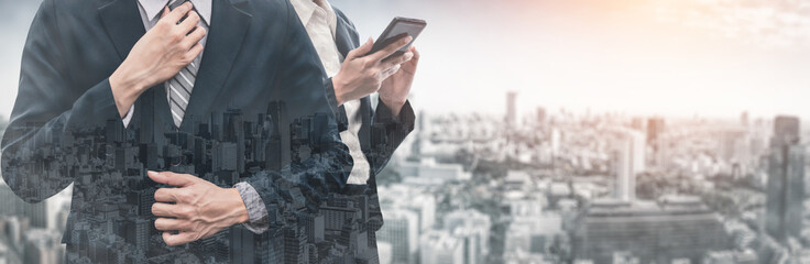 Double Exposure Image of Business Communication Network Technology Concept - Business people using smartphone or mobile phone device on modern cityscape background.