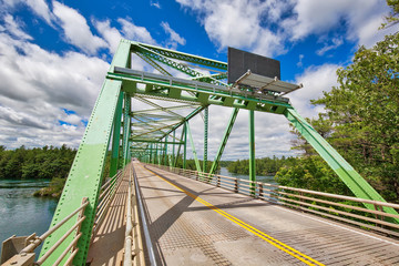 Saint Lawrence River bridge crossing from 1000 islands in Ontario, Canada to USA, New York