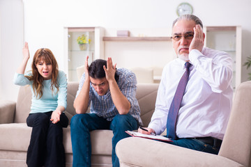 Young pair visiting experienced doctor psychologist