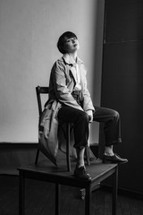 Woman portrait in minimalistic interior