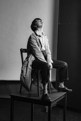 Woman portrait in minimalistic interior