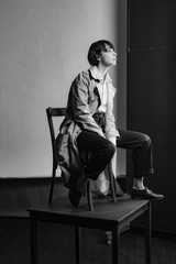 Woman portrait in minimalistic interior