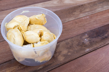 Durian flesh or pulp packed into container for storage