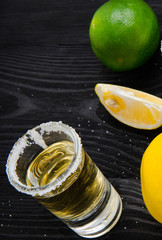 Tequila drink served in glasses with lime and salt