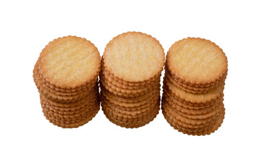 Crackers  light yellow circles attractive to eat.There are three rows combined pile. Isolated on white background.Top view.