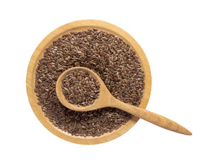 Flaxseed or linseed in wooden spoon on the wooden tray isolated on white background.Herb, cereal, Top view.