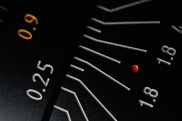 old manual photographic lens with the evident scale of the distance and the aperture