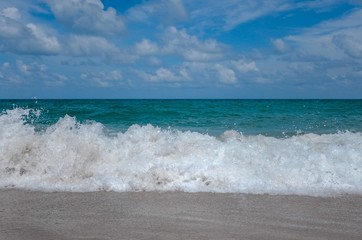 Beach waves and foam at Andaman sea in monsoon season. View for background.