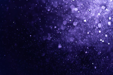 Abstract Purple bokeh defocus glitter blur background.