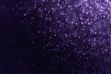 Abstract Purple bokeh defocus glitter blur background.