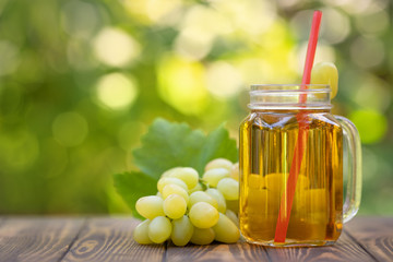 grape juice in glass mason jar