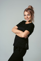 Pretty excited woman happy smile, young attractive girl portrait standing cross hands, looking at camera toothy smiling isolated over white background