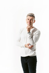 Portrait of handsome male student man looking at camera over white background and showing emotions