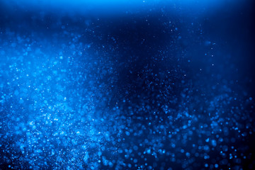 Abstract Blue bokeh defocus glitter blur background.