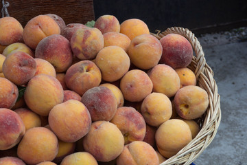 Organic natural peach in a basket