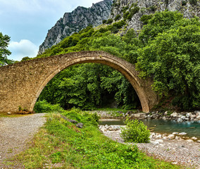 Fototapeta na wymiar Bridge of Agios Vissarionas in Meteora, Thessaly, is situated 1.6 km to the west of Pyli village, bridge was built in 1514.