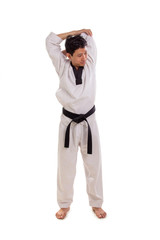 Fototapeta premium Male martial artist back shoulder muscle stretch upwards, full length