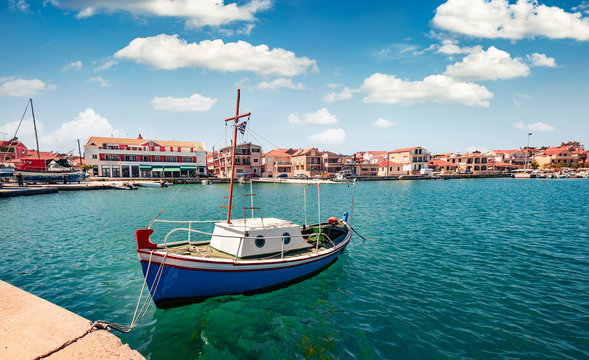 Stunning morning view of Lixouri port. Bright spring seascape of Ionian Sea. Sunny outdoor scene of Cephalonia island. Traveling concept background.