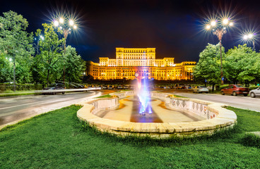 Great night view of Palace of the Parliament. Picturesque evening cityscape of Bucharest city - capital of Transylvania, romaninan, Romania, Europe. Traveling concept background.