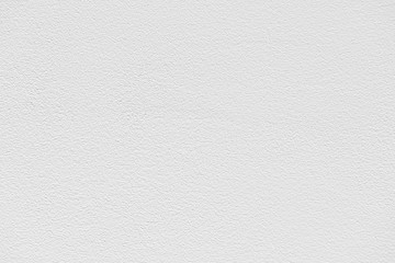 white roughly painted wall fragment