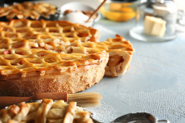 Tasty apple pie on table, closeup