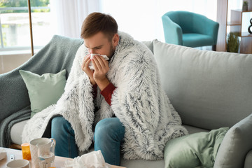 Man ill with flu at home