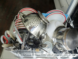 dishwasher full of dirty dishes