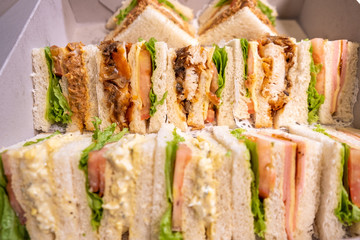 variety of slices of sandwhich pack in a white box