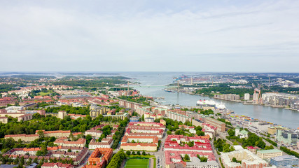 Gothenburg, Sweden. Alvsborg Bridge. (Elvsborgsbrunn) Panorama of the city central part of the city. Cloudy weather, From Drone