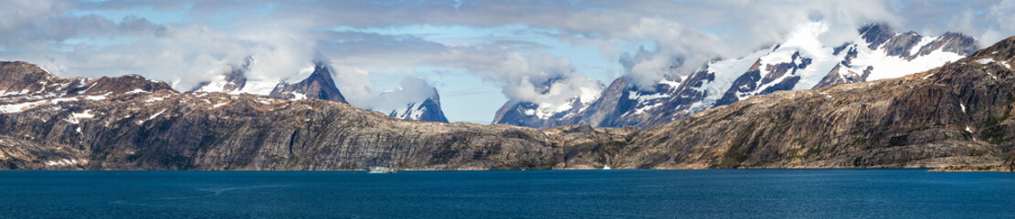 Panoramic view ofthe Skjoldungen, a coastal island in the southeastern shores of Greenland. It is located between two fjords, the Southern Skjoldungen Fjord.