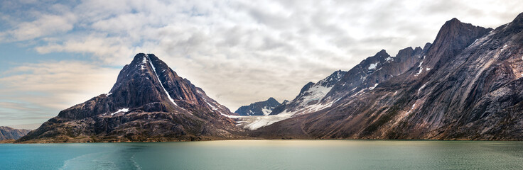 Panoramic view ofthe Skjoldungen, a coastal island in the southeastern shores of Greenland. It is located between two fjords, the Southern Skjoldungen Fjord.