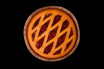 Strawberry pie isolated on black background