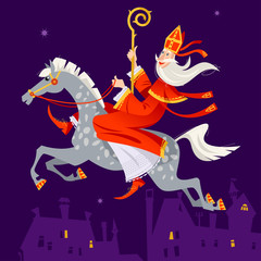 Santa Claus (Sinterklaas) rides a horse over the city at night. Christmas in Holland.