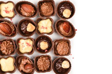 Mix of tasty chocolate candy collection isolated on white. Copy space.