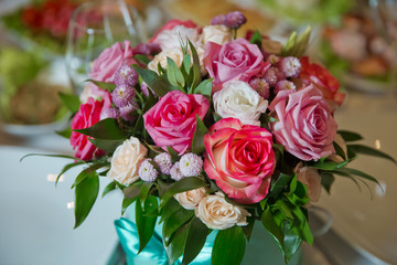 Pink, white, yellow flower bouquet . white, purple roses .Roses with bokeh in the background,Roses for Valentine's Day . Bouquet flower decor for valentine . Purple, white, yellow flowers.