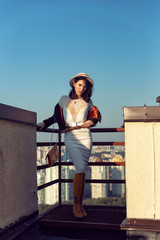 Stylish young girl in an autumn look